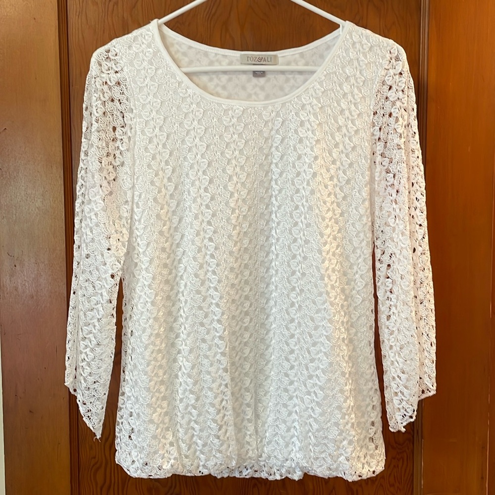 White, lacy, dressy top. Size small.